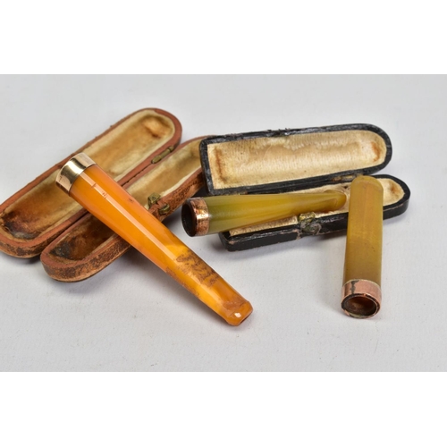 71 - THREE CHEROOT HOLDERS, the first a cased yellow Bakelite cheroot mounted with a 12ct gold Birmingham... 