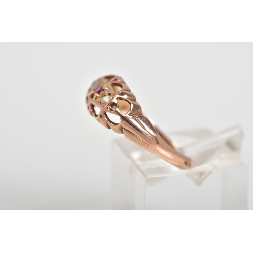 74 - A 9CT GOLD FIVE STONE RING, designed with circular cut rubies interspaced by one single cut and one ... 