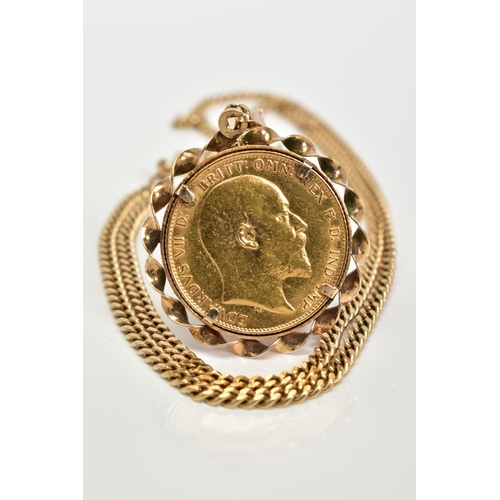 78 - A 9CT GOLD SOVEREIGN NECKLACE, the Edward VII dated 1909, sovereign mounted within a rope twist surr... 