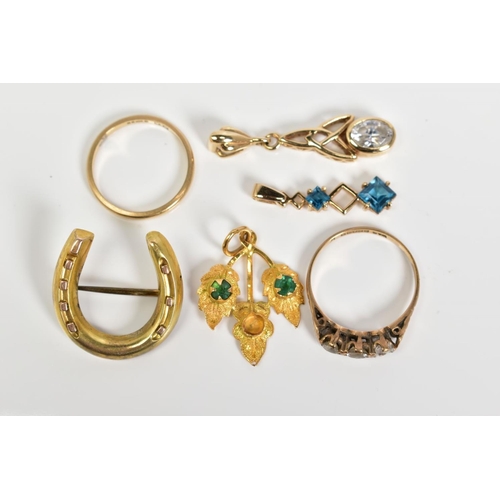 82 - A SELECTION OF ITEMS, to include a 9ct gold pendant set with an oval cut cubic zirconia, Chester hal... 