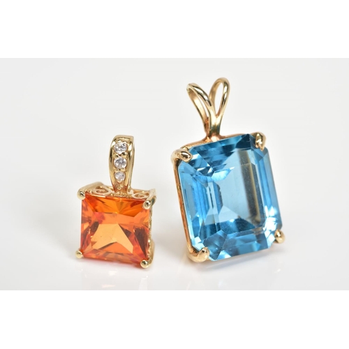 84 - TWO PENDANTS, the first a cushion cut blue stone assessed as topaz within a four claw setting, with ... 