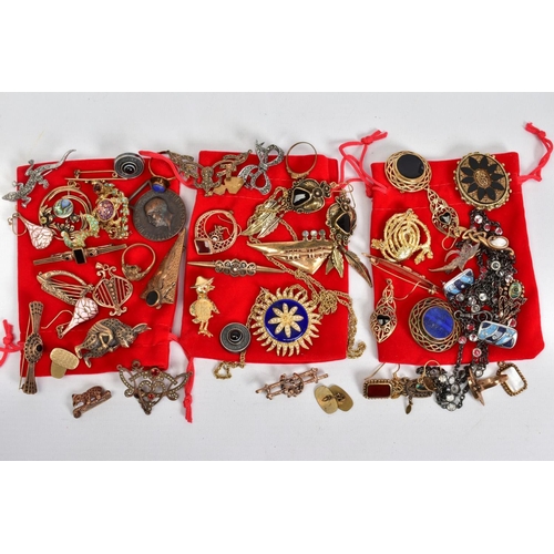 90 - A SELECTION OF ITEMS, to include three red velvet bags filled with costume jewellery such as brooche... 