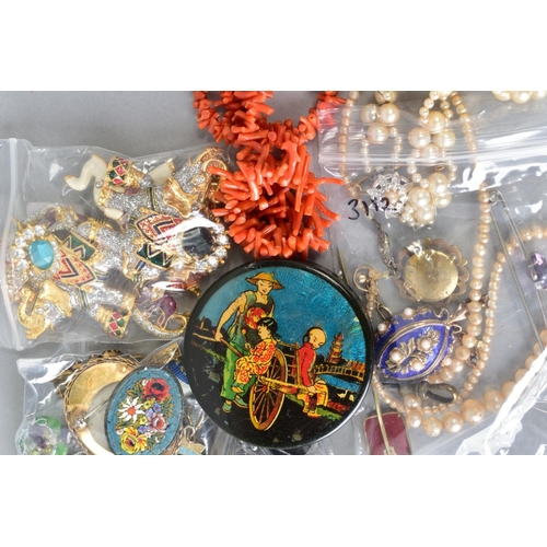 97 - A SELECTION OF COSTUME JEWELLERY, to include brooches of various designs such as Elephants, cameos, ... 