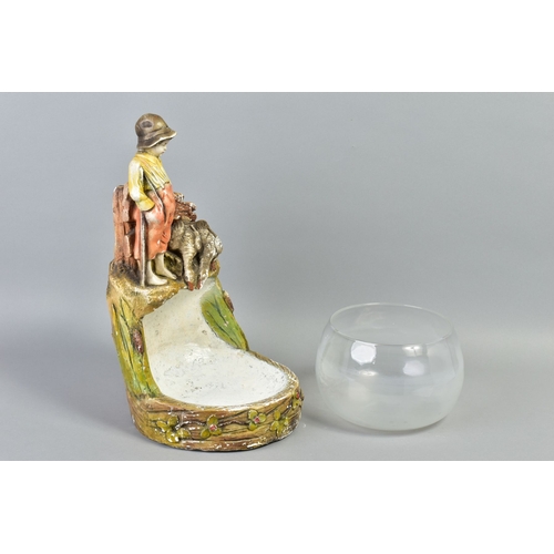 222A - A 1920'S/30'S GLASS FISH BOWL ON FIGURAL PLASTER STAND, modelled as a bare footed young boy with fis... 