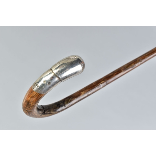 226A - A GEORGE V SILVER MOUNTED WALKING STICK, the tip of the curve with hallmarked mount, maker Henry Per... 