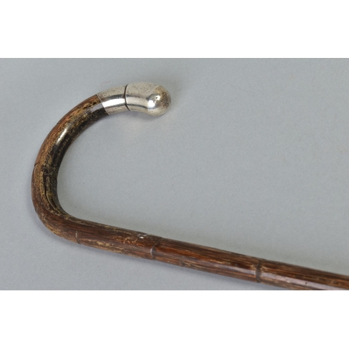 226A - A GEORGE V SILVER MOUNTED WALKING STICK, the tip of the curve with hallmarked mount, maker Henry Per... 