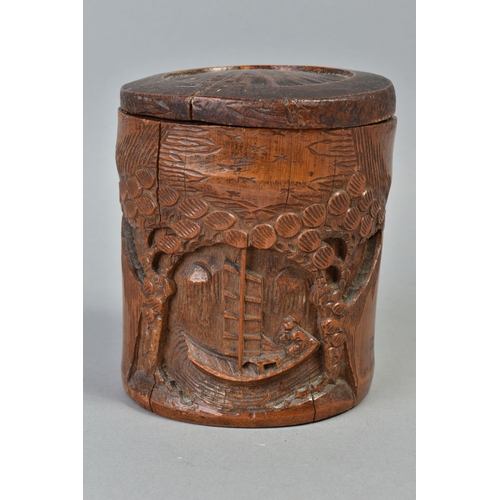 230A - AN EARLY 20TH CENTURY CHINESE BAMBOO BRUSH POT, carved with a man in a boat with overhanging trees, ... 