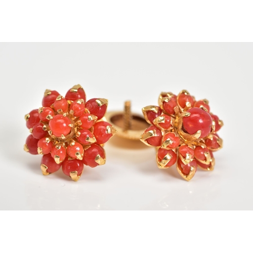 24 - A PAIR OF CORAL EAR STUDS, a round cluster measuring approximately 16.6mm in diameter, screw post fi... 