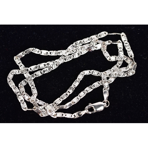 32 - A MODERN FANCY FLAT LINK CHAIN, measuring approximately 440mm in length, stamped '750 ITALY', gross ... 