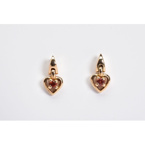 40 - A PAIR OF SMALL GARNET HEART DROP EARRINGS, fitted to a screw post and scroll fitting, stamped '18k'... 