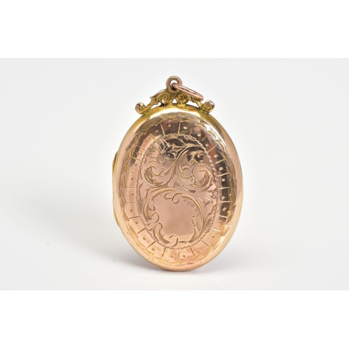 47 - AN OVAL ENGRAVED LOCKET, a hinged locket with a 9ct gold back and front, featuring floral engravemen... 