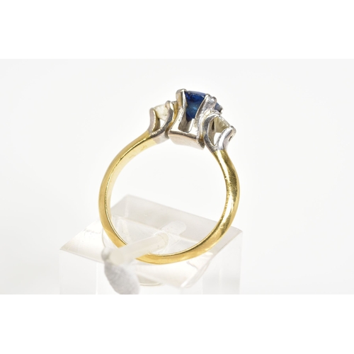 62 - A THREE STONE RING, set with a central cushion cut sapphire flanked with two round brilliant cut dia... 