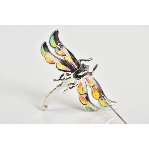 69 - A PLIQUE-A-JOUR BROOCH, in the form of a dragonfly, displaying red, yellow and green enamel wings, s... 