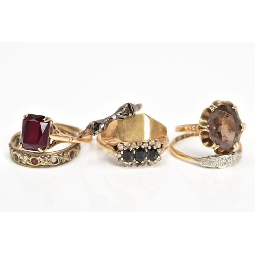 76 - A SELECTION OF SEVEN 9CT GOLD RINGS, to include a diamond ring, set with a single cut diamond within... 