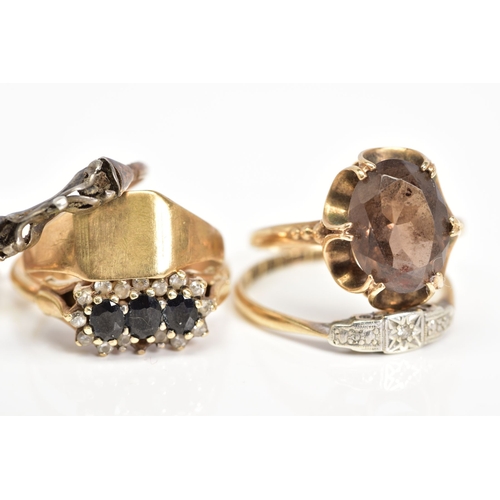 76 - A SELECTION OF SEVEN 9CT GOLD RINGS, to include a diamond ring, set with a single cut diamond within... 