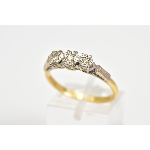 77 - AN 18CT GOLD THREE STONE DIAMOND RING, set with three single cut diamonds within an illusion setting... 