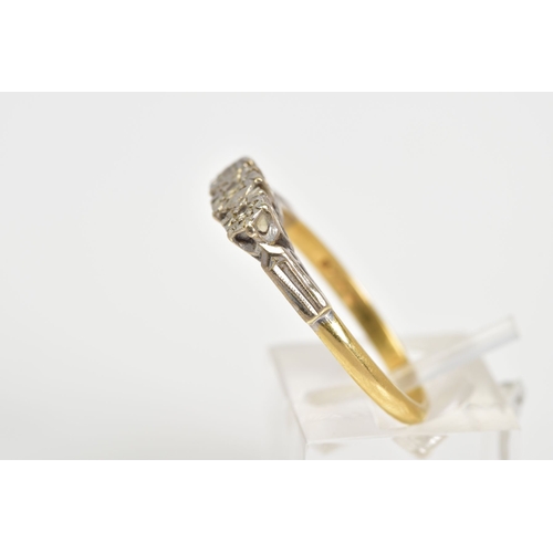 77 - AN 18CT GOLD THREE STONE DIAMOND RING, set with three single cut diamonds within an illusion setting... 