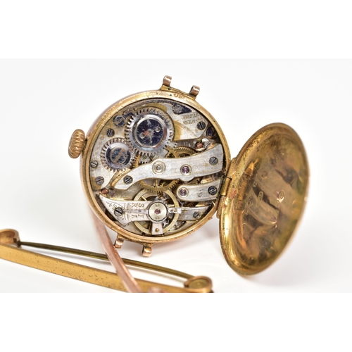 78 - A WATCH AND TWO BROOCHES, the Swiss made watch movement of circular design with a gold and cream dia... 