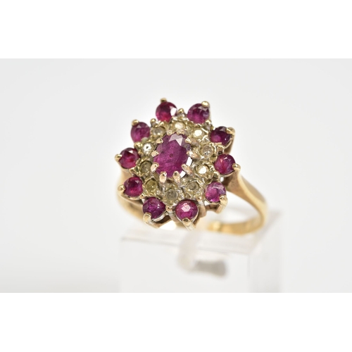 89 - A 9CT GOLD CLUSTER RING, designed with a central oval cut garnet and single cut diamond and circular... 