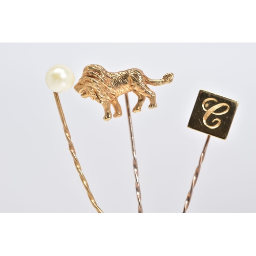 94 - A SELECTION OF HAT PINS, the first in the form of a lion, with a 9ct hallmark for London, the second... 