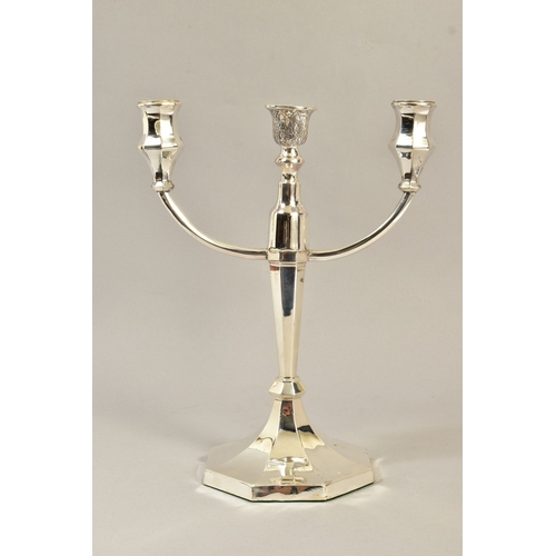 105 - A GEORGE VI SILVER CANDELABRUM, three branch with two shaped octagonal candleholders and an engraved... 