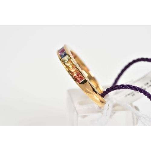 142 - A 9CT GOLD SAPPHIRE RING, the half eternity style ring, set with a row of multi coloured princess cu... 