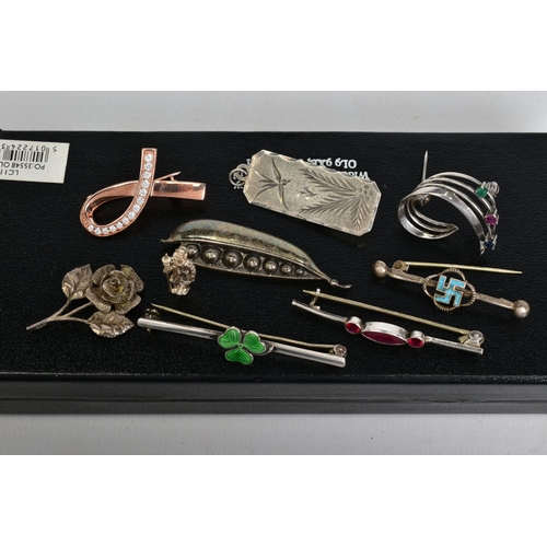 156 - A SELECTION OF ITEMS, to include an engraved floral and bird scene pendant, with a silver hallmark f... 