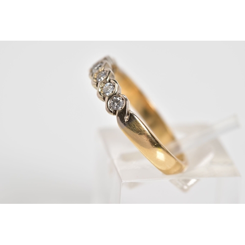 173 - A DIAMOND HALF ETERNITY RING, set with a row of round brilliant cut diamonds, each within a crossove... 