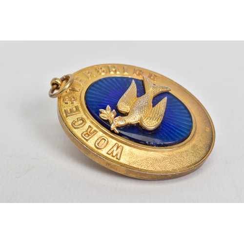 175 - A SILVER GILT MEDALLION, of oval shape featuring a blue enamel centre with bird embellishment and Wo... 