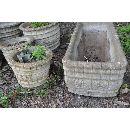 1020 - THREE LARGE ROUND COMPOSITE GARDEN PLANTERS, 39cm diameter and 30cm high, a pair of smaller 29cm dia... 