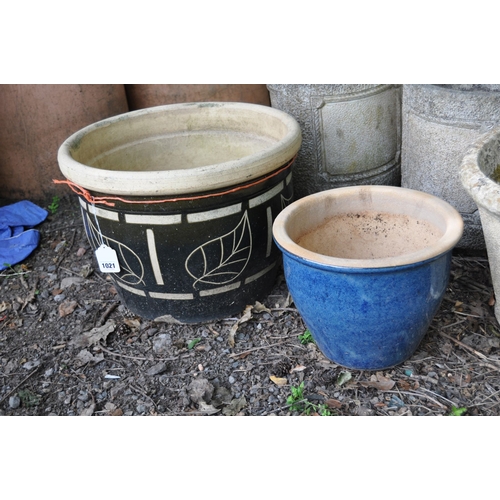 1021 - SEVEN GARDEN PLANTERS, including a pair of terracotta pipes, 26cm diameter x 32cm high, a pair of co... 