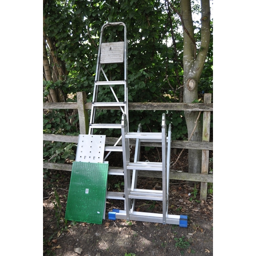 1022 - AN ALUMINUM FOLDING PLATFORM LADDER, with three rungs to each of the four sections, 100cm long, fold... 