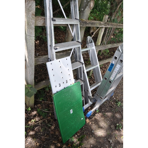 1022 - AN ALUMINUM FOLDING PLATFORM LADDER, with three rungs to each of the four sections, 100cm long, fold... 