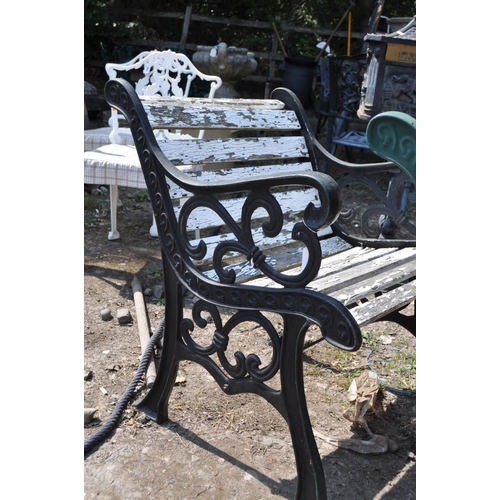 1002 - A NEAR PAIR OF MODERN CAST METAL GARDEN CHAIRS, one painted black with white painted slats the other... 