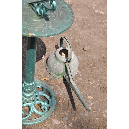 1014 - A MODERN CAST METAL SUN DIAL, with time, day and month markings to dial, on a tapered stem with fret... 