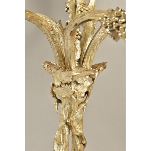 107 - A VICTORIAN ELKINGTON PLATE SIX LIGHT CANDELABRUM, cast with fruiting vine on a entwined trunk stem,... 