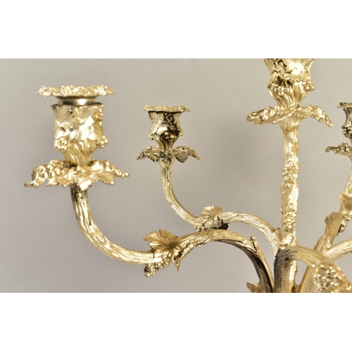 107 - A VICTORIAN ELKINGTON PLATE SIX LIGHT CANDELABRUM, cast with fruiting vine on a entwined trunk stem,... 