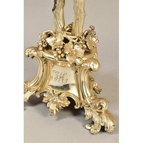 107 - A VICTORIAN ELKINGTON PLATE SIX LIGHT CANDELABRUM, cast with fruiting vine on a entwined trunk stem,... 