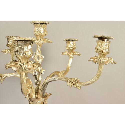 107 - A VICTORIAN ELKINGTON PLATE SIX LIGHT CANDELABRUM, cast with fruiting vine on a entwined trunk stem,... 