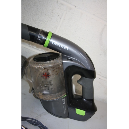 1103 - A G TECH 22V AIR RAM (adapted with PSU) a G Tech 22V handheld vacuum with PSU, two new filters, an u... 