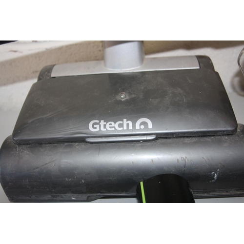 1103 - A G TECH 22V AIR RAM (adapted with PSU) a G Tech 22V handheld vacuum with PSU, two new filters, an u... 