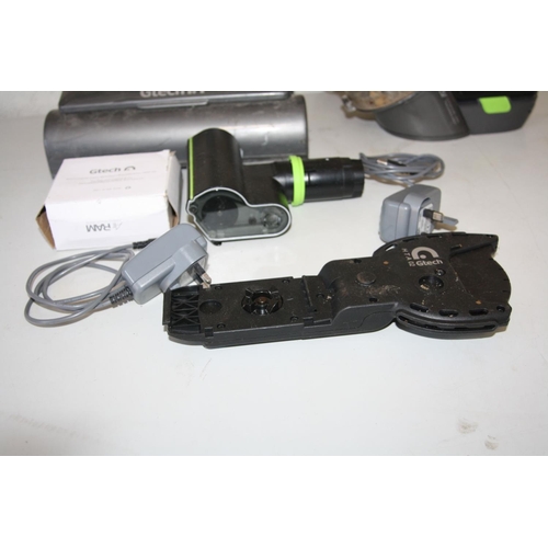 1103 - A G TECH 22V AIR RAM (adapted with PSU) a G Tech 22V handheld vacuum with PSU, two new filters, an u... 