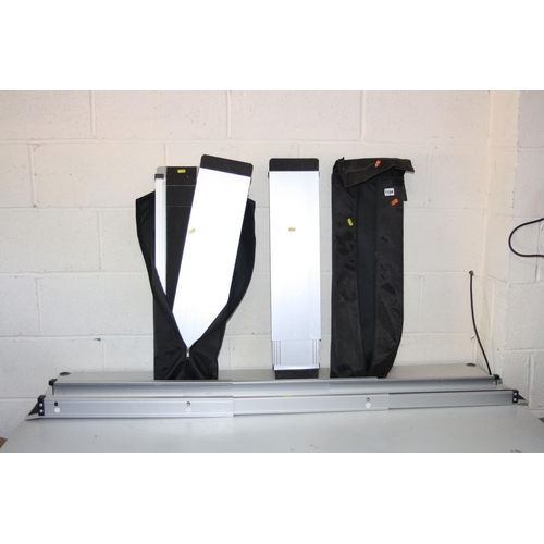 1104 - TWO TELESCOPIC WHEELCHAIR RAMPS in carrying cases both sets 75cm closed and 122cm extended