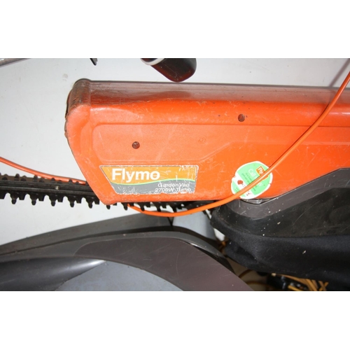 1106 - A FLYMO EASYGLIDE 300V LAWN MOWER (untested no cable), a Flymo Garden vac 2700WT turbo garden vac (P... 