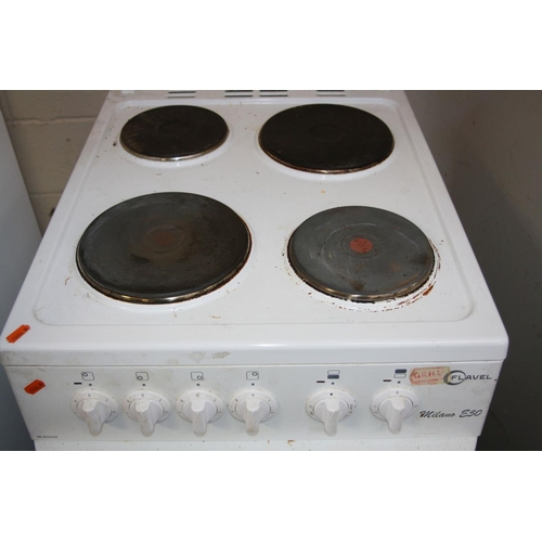 1115 - A FLAVEL MILANO E50 ELECTRIC COOKER, with oven, grill and a four ring hob (not tested)