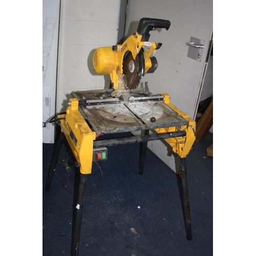 1119 - A DEWALT DW743 FLIP OVER SAW, 110 volt with four detachable legs (untested due to voltage)