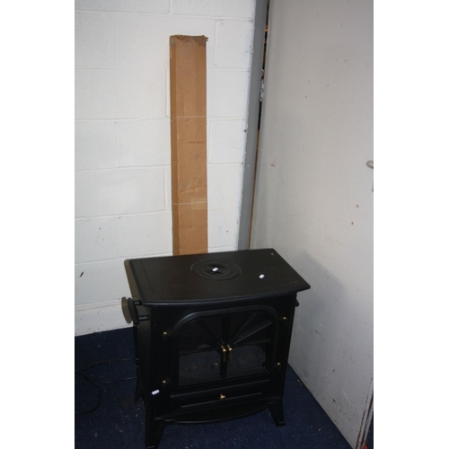 1120 - A POUNDSTRETCHER LARGE STOVE HEATER, 1850w (PAT pass and working), a boxed cast metal facial pack an... 