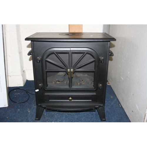 1120 - A POUNDSTRETCHER LARGE STOVE HEATER, 1850w (PAT pass and working), a boxed cast metal facial pack an... 