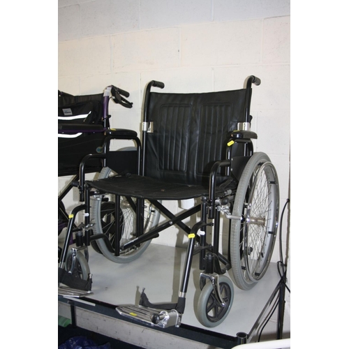 1123 - TWO WHEELCHAIRS, both with footrests, one is a Days with a metallic purple finish and a standard 40c... 