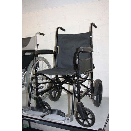 1124 - TWO WHEELCHAIRS, both with footrests, one is a Enigma with a silver finish and a standard 4cm wide s... 